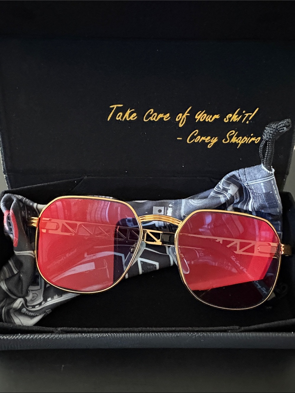 Gold Frame Sunglasses with Red Lenses